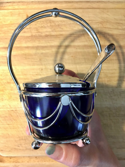 Antique English Queen Anne cobalt blue glass jam bowl or granulated sugar bowl with silver-plate chromium metal stand, lid, and spoon by 1920s art deco era Mayell E.P. of England